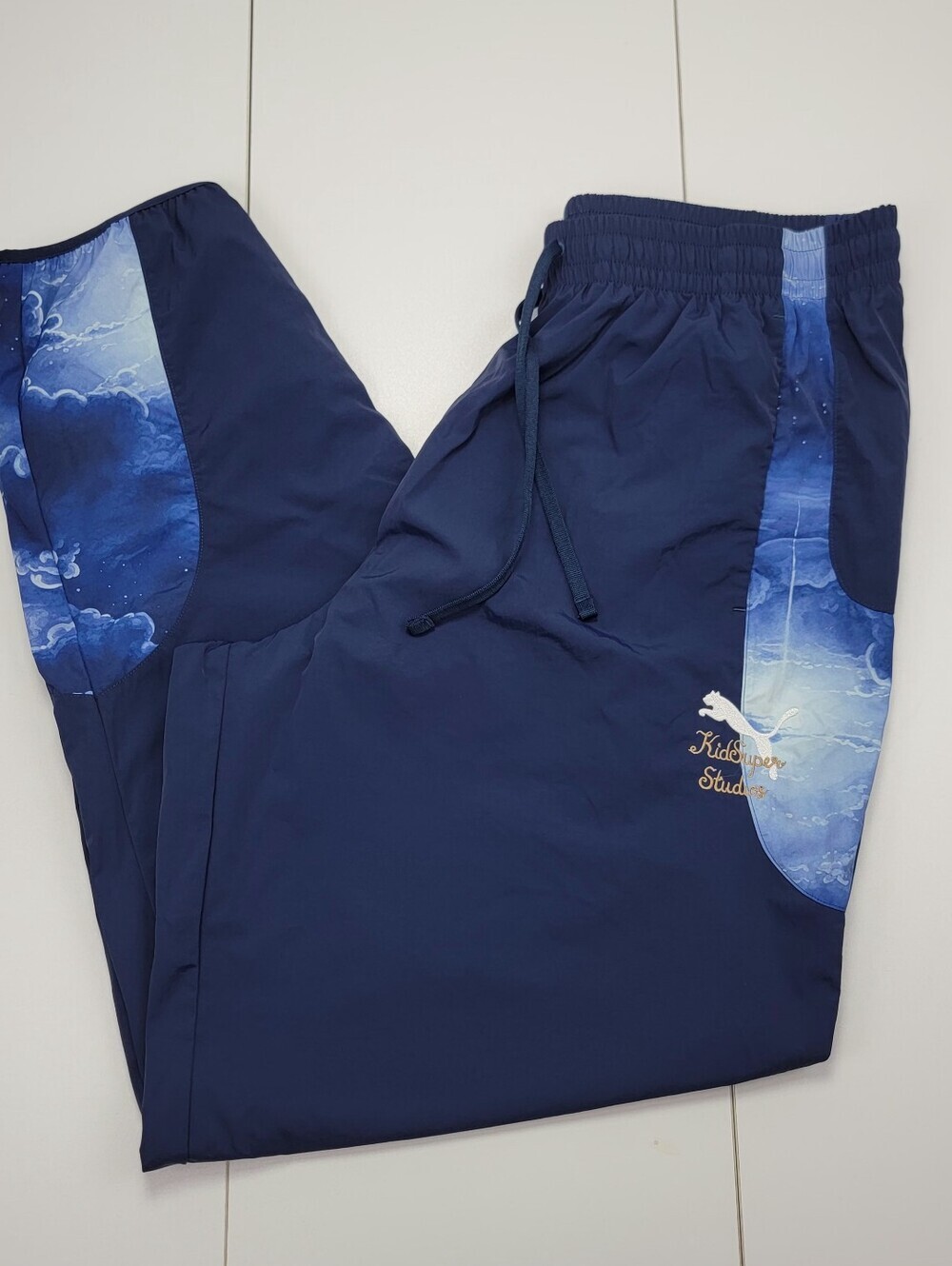 Puma KidSuper Al-Hilal SFC Travel Pants Navy Blue Cloud Print 606853 20 Mens L - Picture 1 of 15